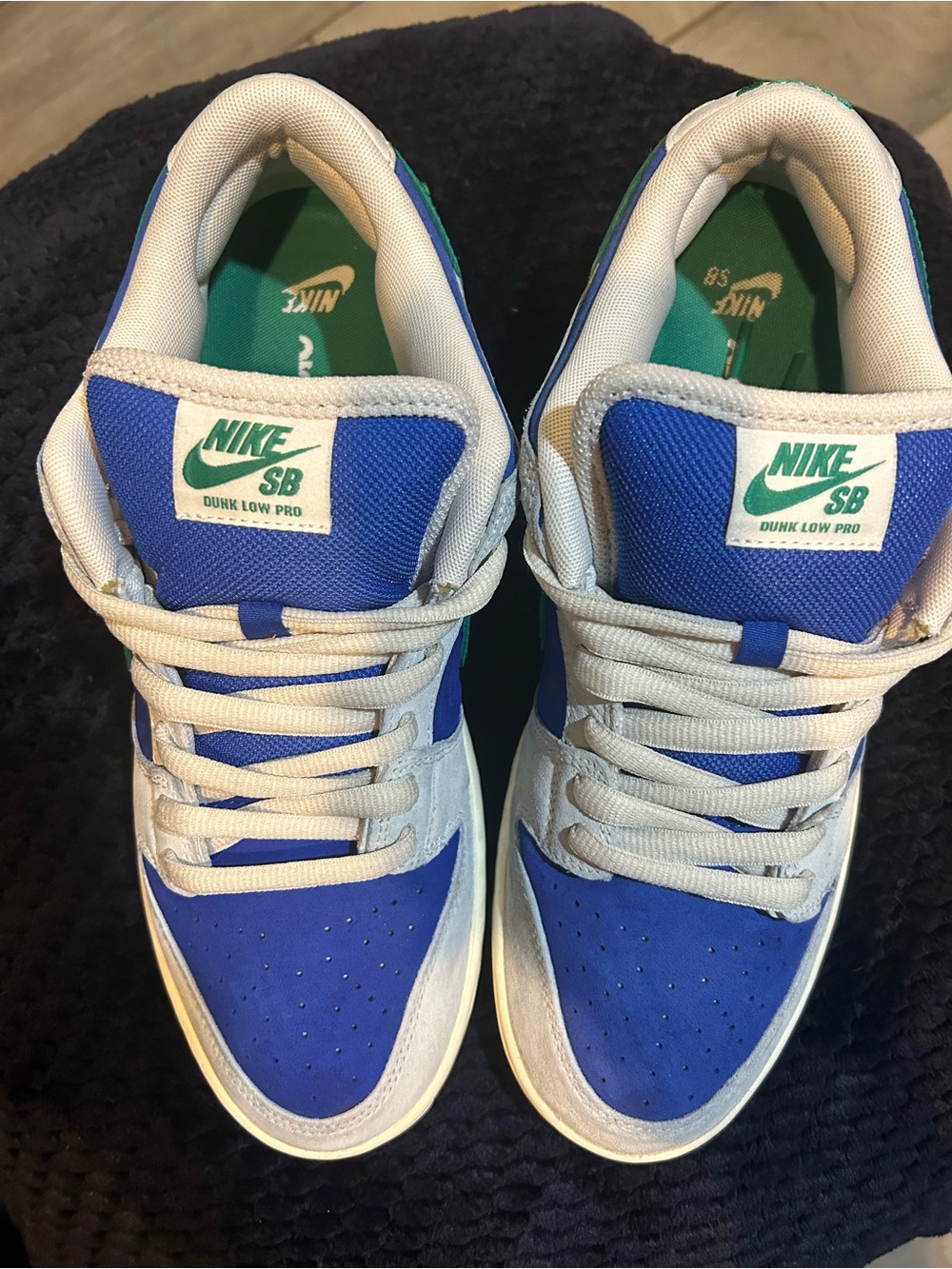 Nike Menโs Blue and White SB Dunk Low Pro Sneakers